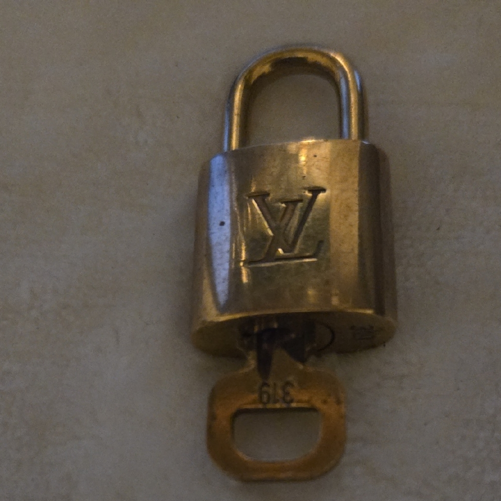 Louis Vuitton Gold Lock and Key Set